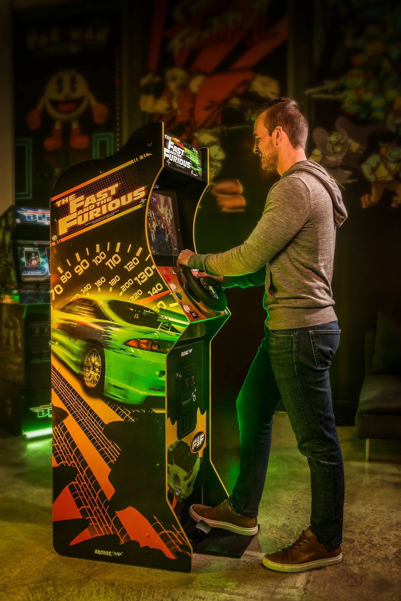 Arcade1Up Fast and Furious Deluxe racing arcade machine with steering wheel and pedals